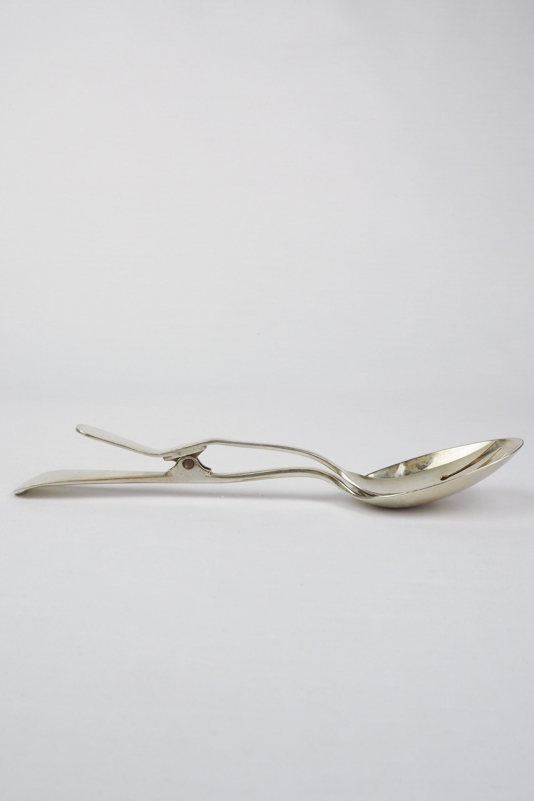 Silver Plate Hinged Salad Servers have a wonderful stone washed patina to the silver.