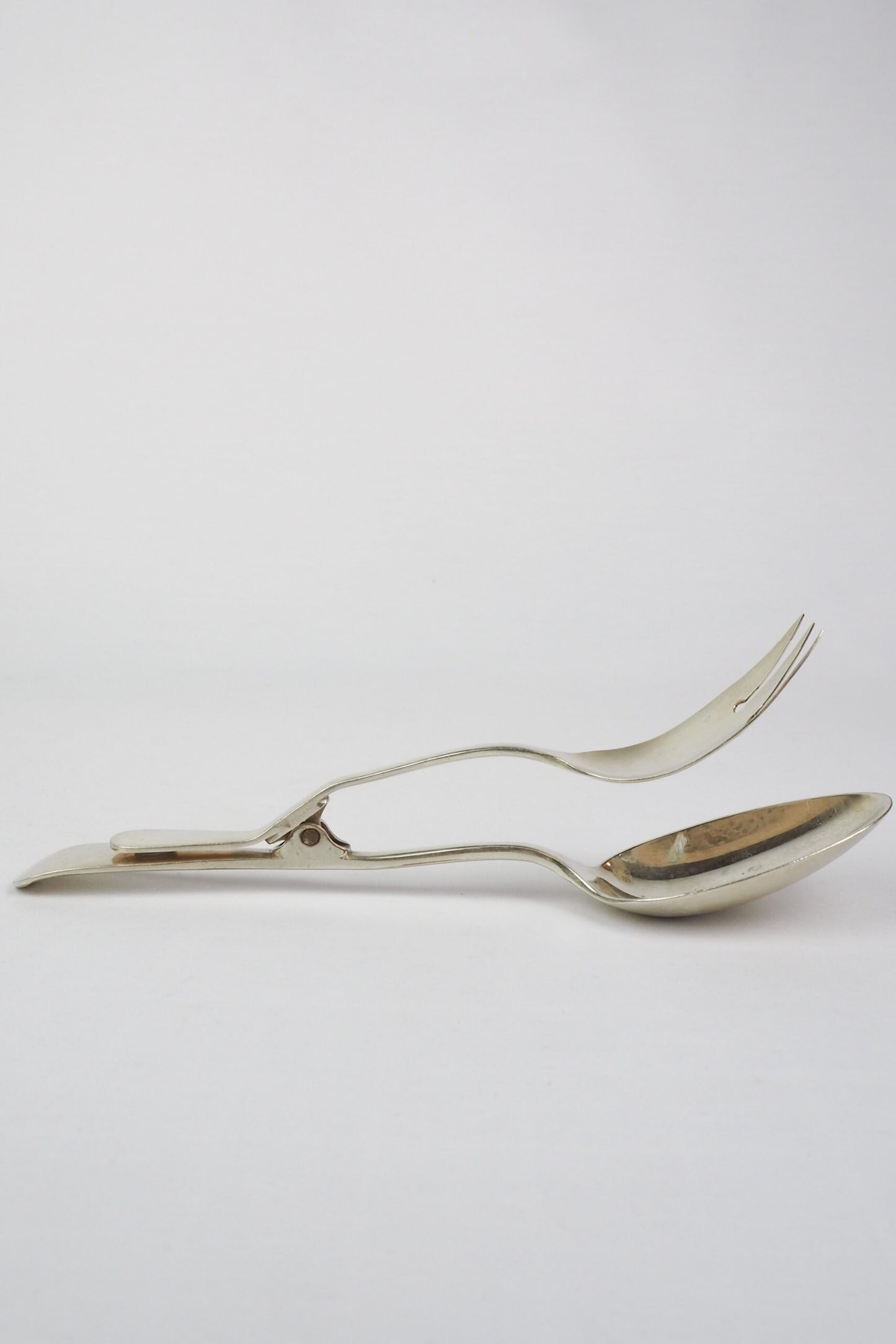 Silver Plate Hinged Salad Servers have a wonderful stone washed patina to the silver.
