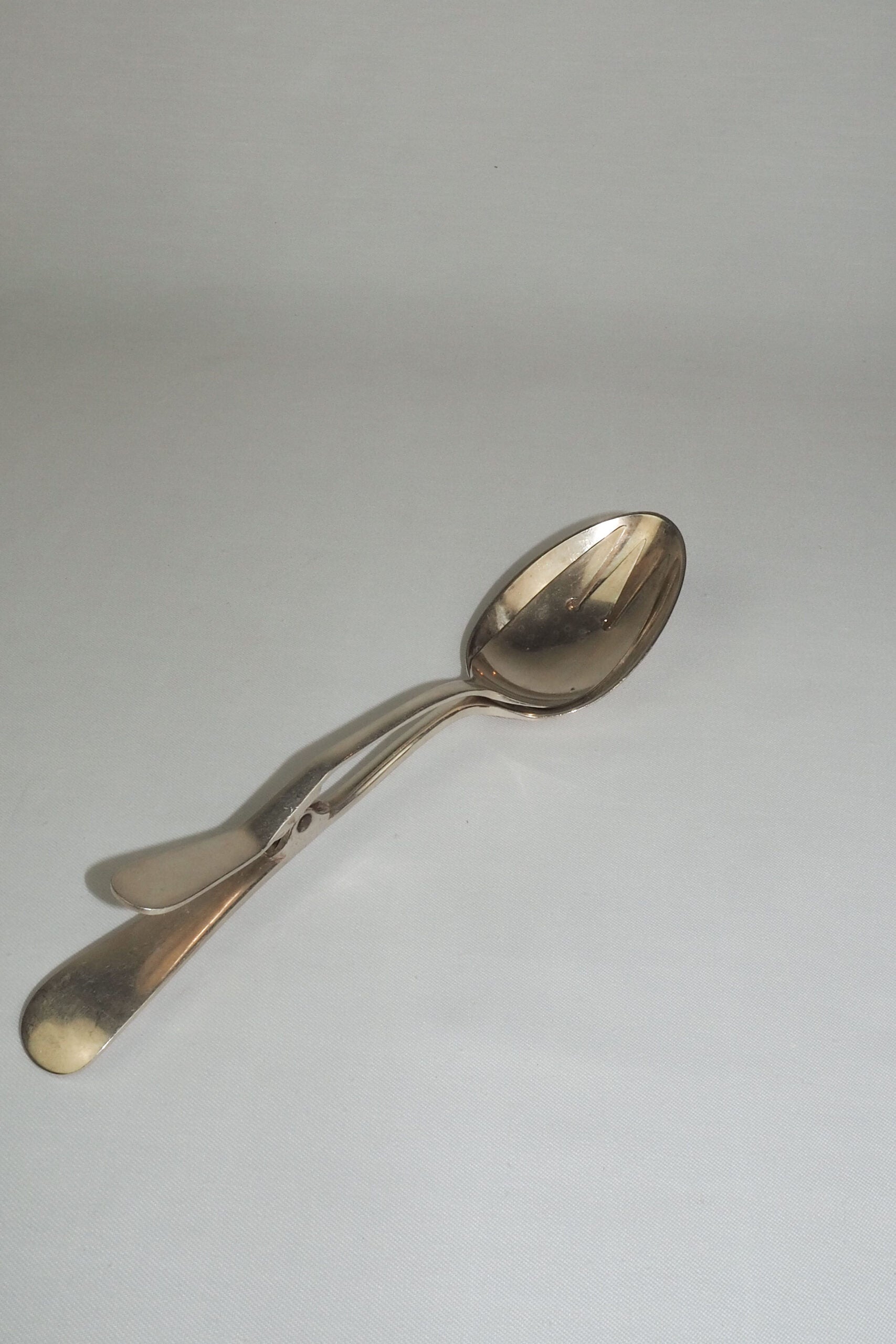 Silver Plate Hinged Salad Servers have a wonderful stone washed patina to the silver.