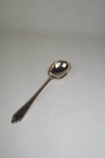 This stunning Antique Fruit Salad Spoon is the perfect piece for your kitchen. With an incredible crimped edge bowl of the spoon and a decorative handle