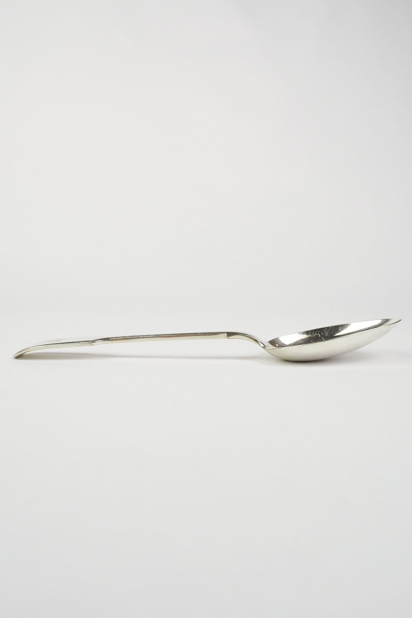 This Antique Silver Plate Serving Spoon is a stunning piece of service ware. Perfect for an elegant tablescape. Sourced for Wildmore. 