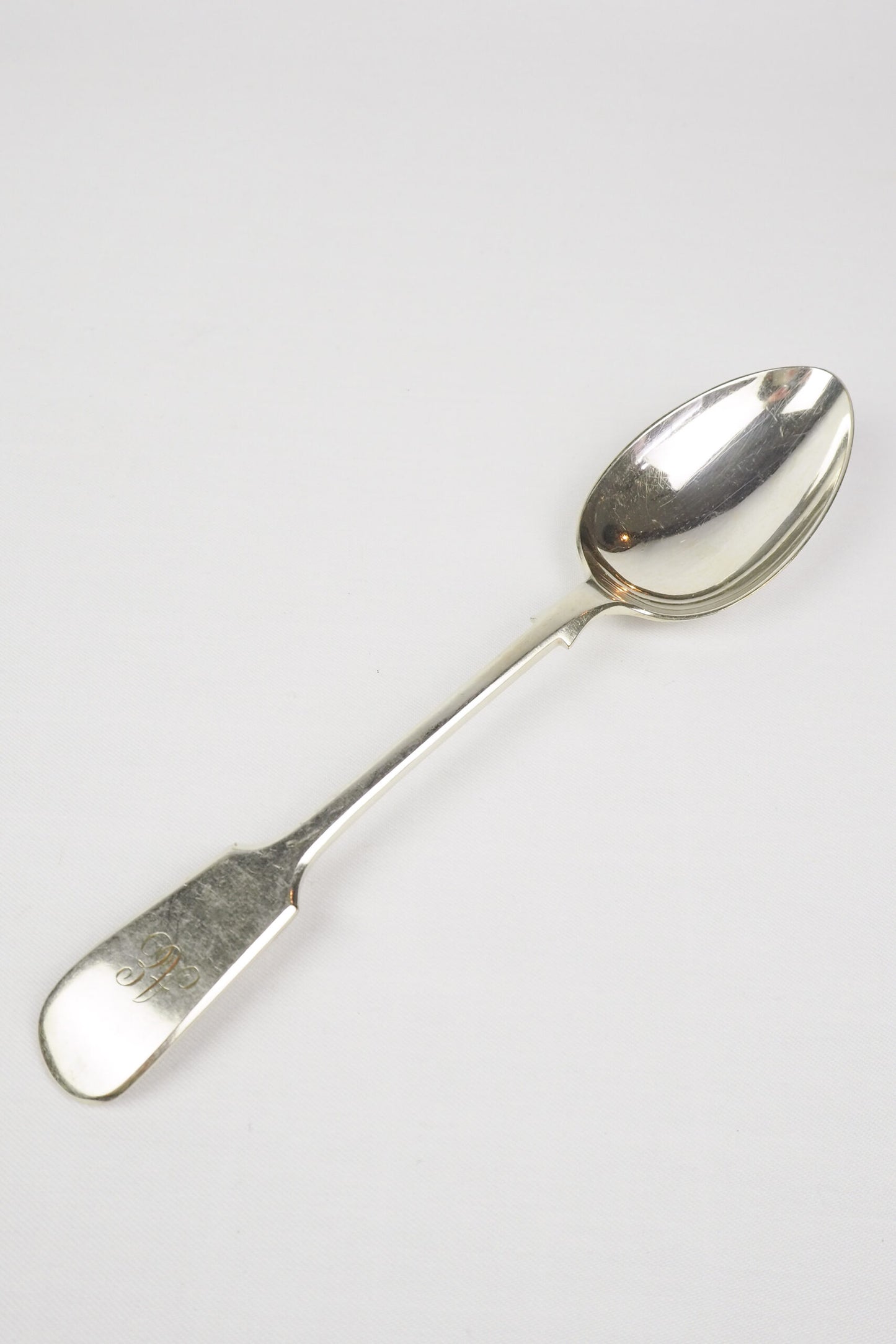 This Antique Silver Plate Serving Spoon is a stunning piece of service ware. Perfect for an elegant tablescape. Sourced for Wildmore. 
