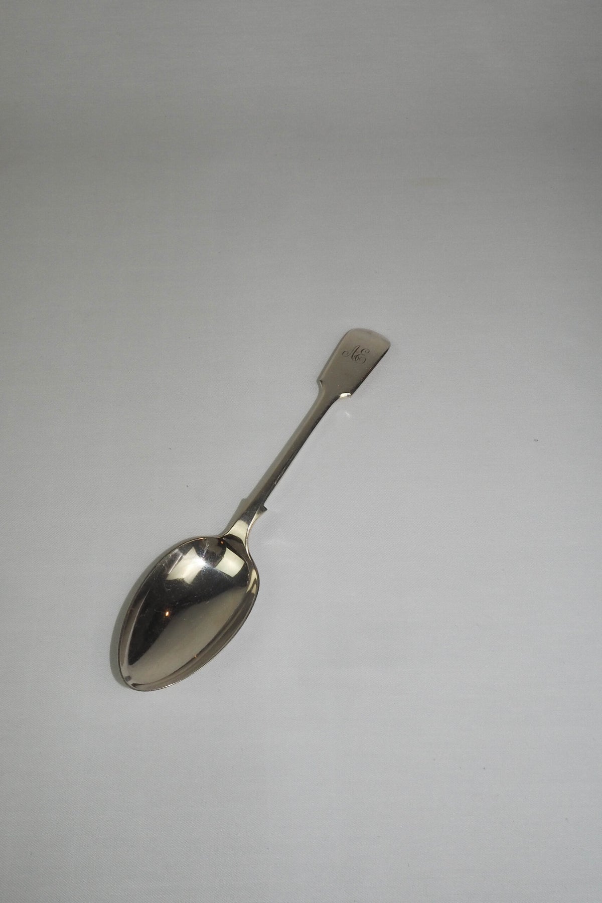 This Antique Silver Plate Serving Spoon is a stunning piece of service ware. Perfect for an elegant tablescape. Sourced for Wildmore. 