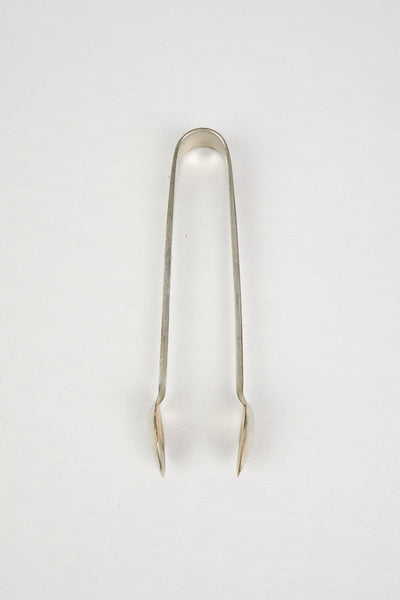 This Vintage Set of Silver Plate Sugar Tongs have a vintage stone washed patina to the silver plate and a decorative etched floral pattern. 