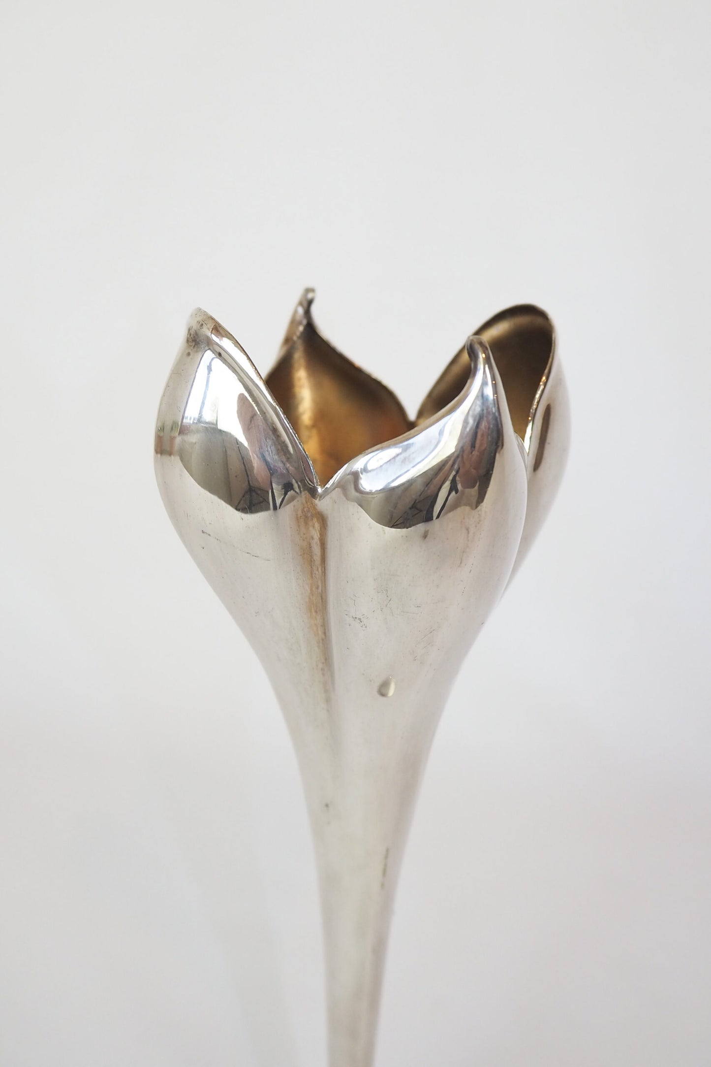 A stunning Vintage Silver Plate Flower Vase in the shape of a tulip. Tulip shaped bud vase sourced by Wildmore