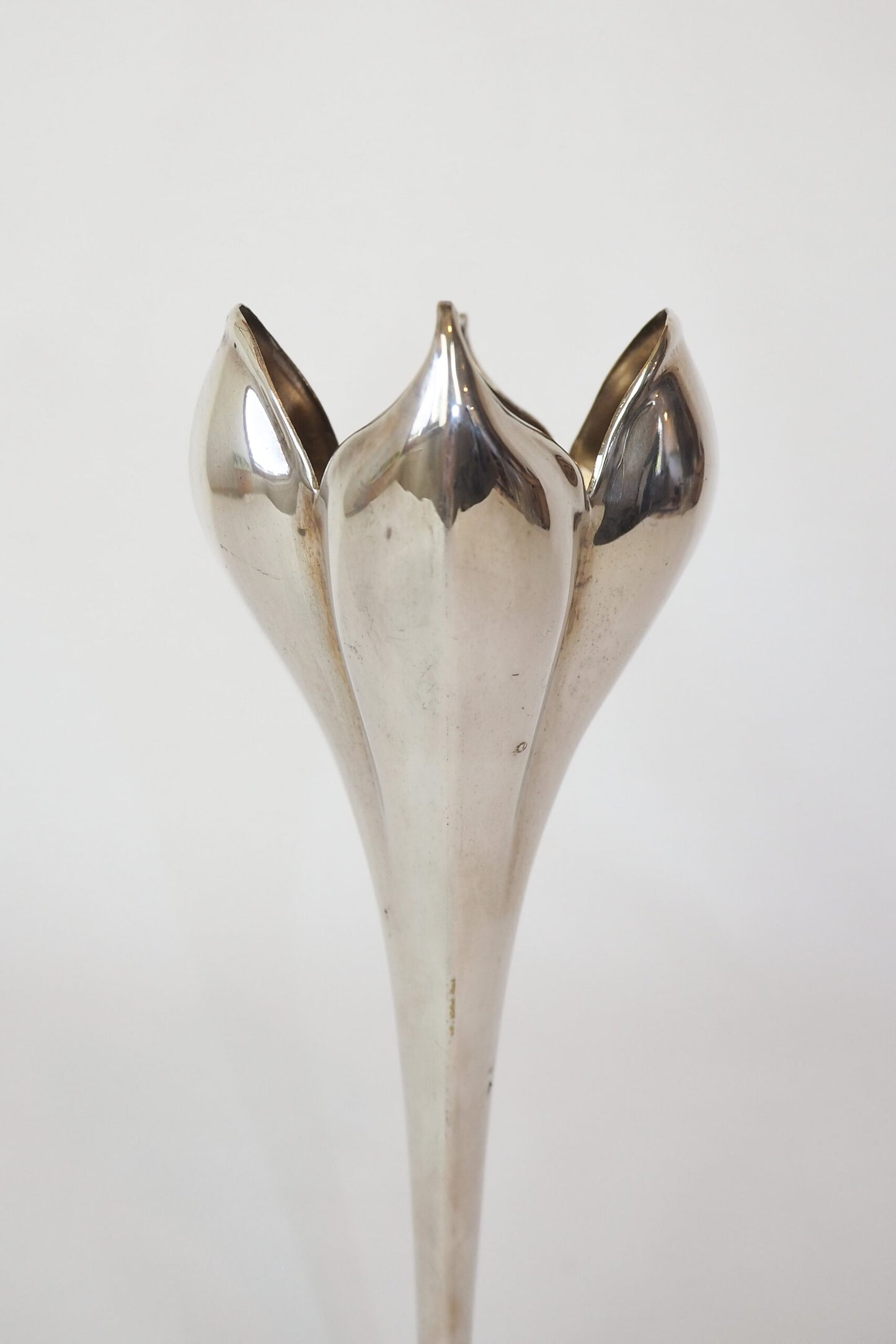 A stunning Vintage Silver Plate Flower Vase in the shape of a tulip. Tulip shaped bud vase sourced by Wildmore