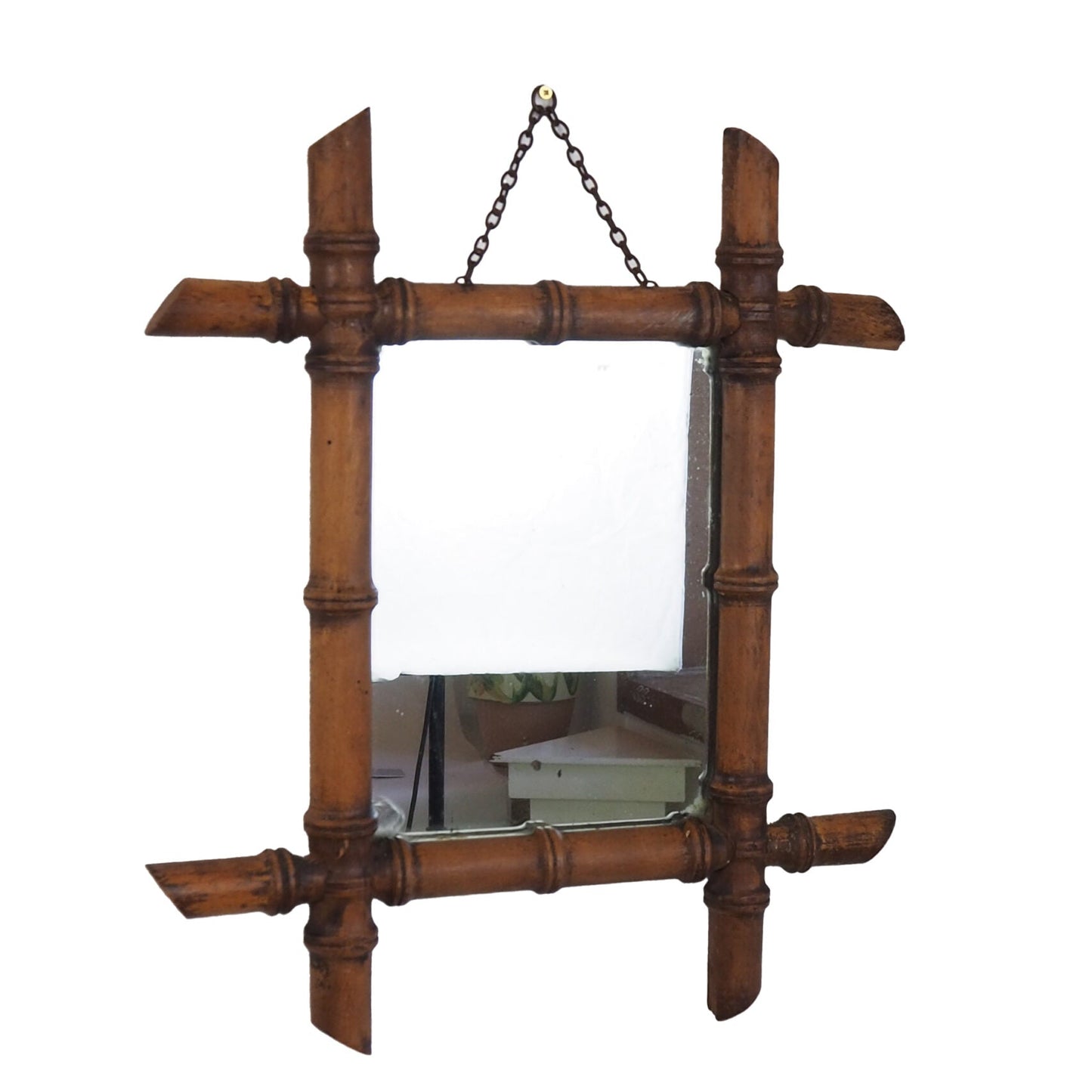 A stunning example of an early Antique French Faux Bamboo Mirror. This beautifully foxed glass is framed by a hand turned wooden frame.