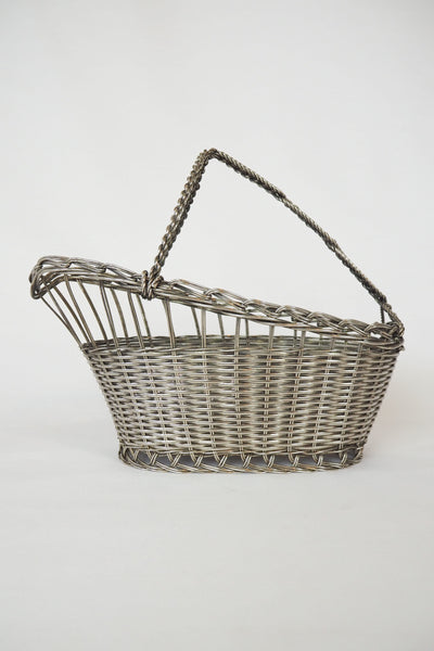 This Vintage Silver Plate Wine Bottle Holder is a great centrepiece for your party. The elegant style gives this silver plate wine server timeless appeal.