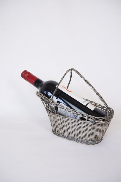 This Vintage Silver Plate Wine Bottle Holder is a great centrepiece for your party. The elegant style gives this silver plate wine server timeless appeal.