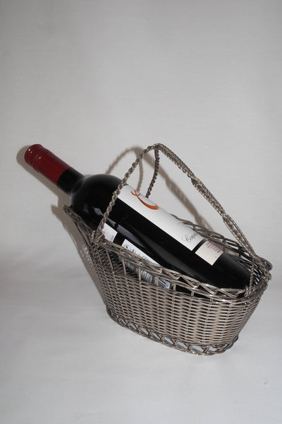 This Vintage Silver Plate Wine Bottle Holder is a great centrepiece for your party. The elegant style gives this silver plate wine server timeless appeal.
