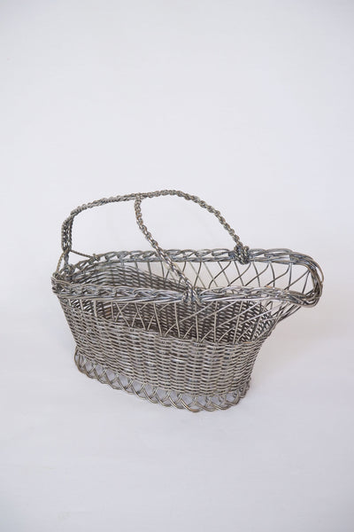 This Vintage Silver Plate Wine Bottle Holder is a great centrepiece for your party. The elegant style gives this silver plate wine server timeless appeal.
