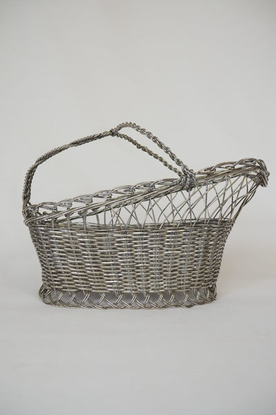 This Vintage Silver Plate Wine Bottle Holder is a great centrepiece for your party. The elegant style gives this silver plate wine server timeless appeal.