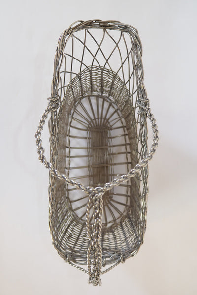 This Vintage Silver Plate Wine Bottle Holder is a great centrepiece for your party. The elegant style gives this silver plate wine server timeless appeal.