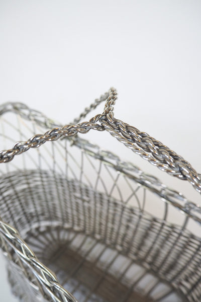 This Vintage Silver Plate Wine Bottle Holder is a great centrepiece for your party. The elegant style gives this silver plate wine server timeless appeal.
