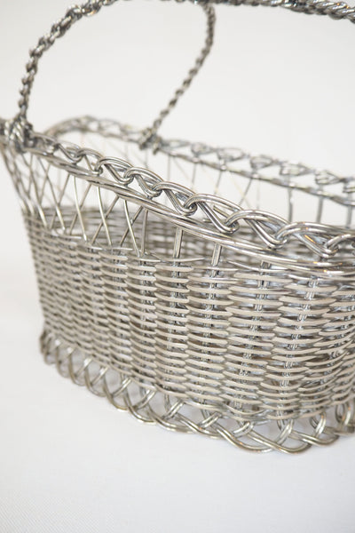 This Vintage Silver Plate Wine Bottle Holder is a great centrepiece for your party. The elegant style gives this silver plate wine server timeless appeal.