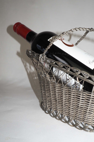 This Vintage Silver Plate Wine Bottle Holder is a great centrepiece for your party. The elegant style gives this silver plate wine server timeless appeal.