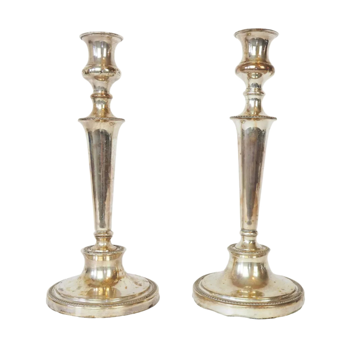 Stunning Pair of Georgian Silver Plate Candlesticks. This stunning pair of tall antique candle sticks are perfect for your coffee table or dinner party tablescape.
