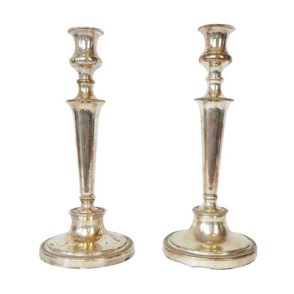 Stunning Pair of Georgian Silver Plate Candlesticks. This stunning pair of tall antique candle sticks are perfect for your coffee table or dinner party tablescape.