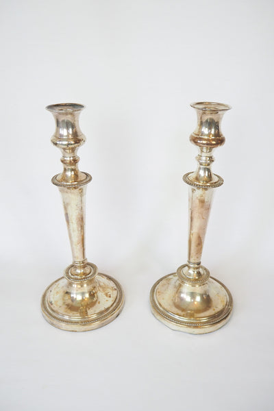 Stunning Pair of Georgian Silver Plate Candlesticks. This stunning pair of tall antique candle sticks are perfect for your coffee table or dinner party tablescape.