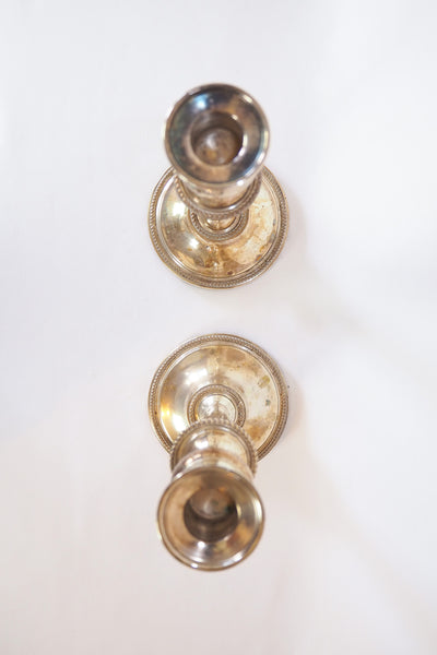 Stunning Pair of Georgian Silver Plate Candlesticks. This stunning pair of tall antique candle sticks are perfect for your coffee table or dinner party tablescape.