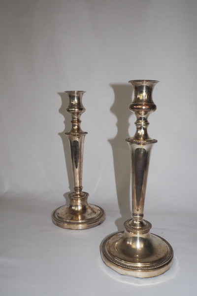 Stunning Pair of Georgian Silver Plate Candlesticks. This stunning pair of tall antique candle sticks are perfect for your coffee table or dinner party tablescape.