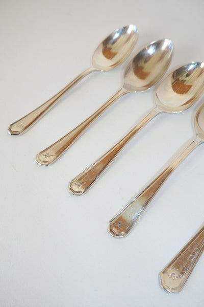 This set of 6 Vintage Silver Plate Teaspoons are monogrammed A and B. The stylish handles give a classic look to these antique teaspoons.