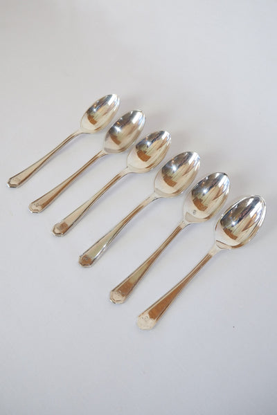 This set of 6 Vintage Silver Plate Teaspoons are monogrammed A and B. The stylish handles give a classic look to these antique teaspoons.