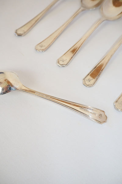 This set of 6 Vintage Silver Plate Teaspoons are monogrammed A and B. The stylish handles give a classic look to these antique teaspoons.