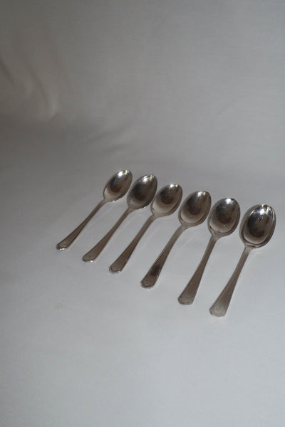 This set of 6 Vintage Silver Plate Teaspoons are monogrammed A and B. The stylish handles give a classic look to these antique teaspoons.