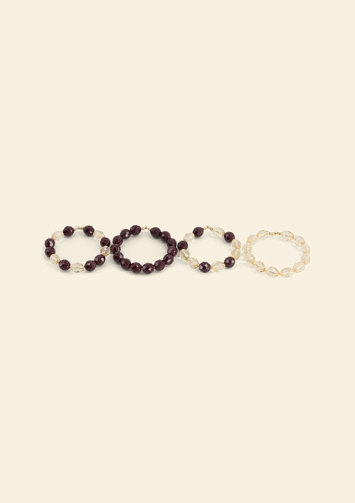 The Ruby & Daffodil Beaded Napkin Rings (set of 4)