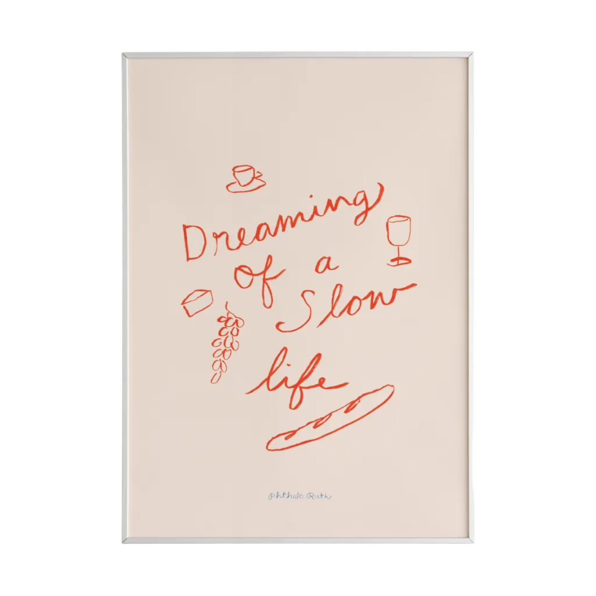 This mini art print features the phrase “Dreaming of a Slow Life” playfully surrounded by wine, cheese, grapes and a baguette painted in red on a white background. 