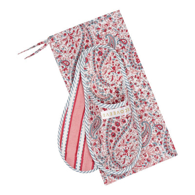 A pair of pink floral patterned bedroom slippers made of cotton, displayed on a white background.