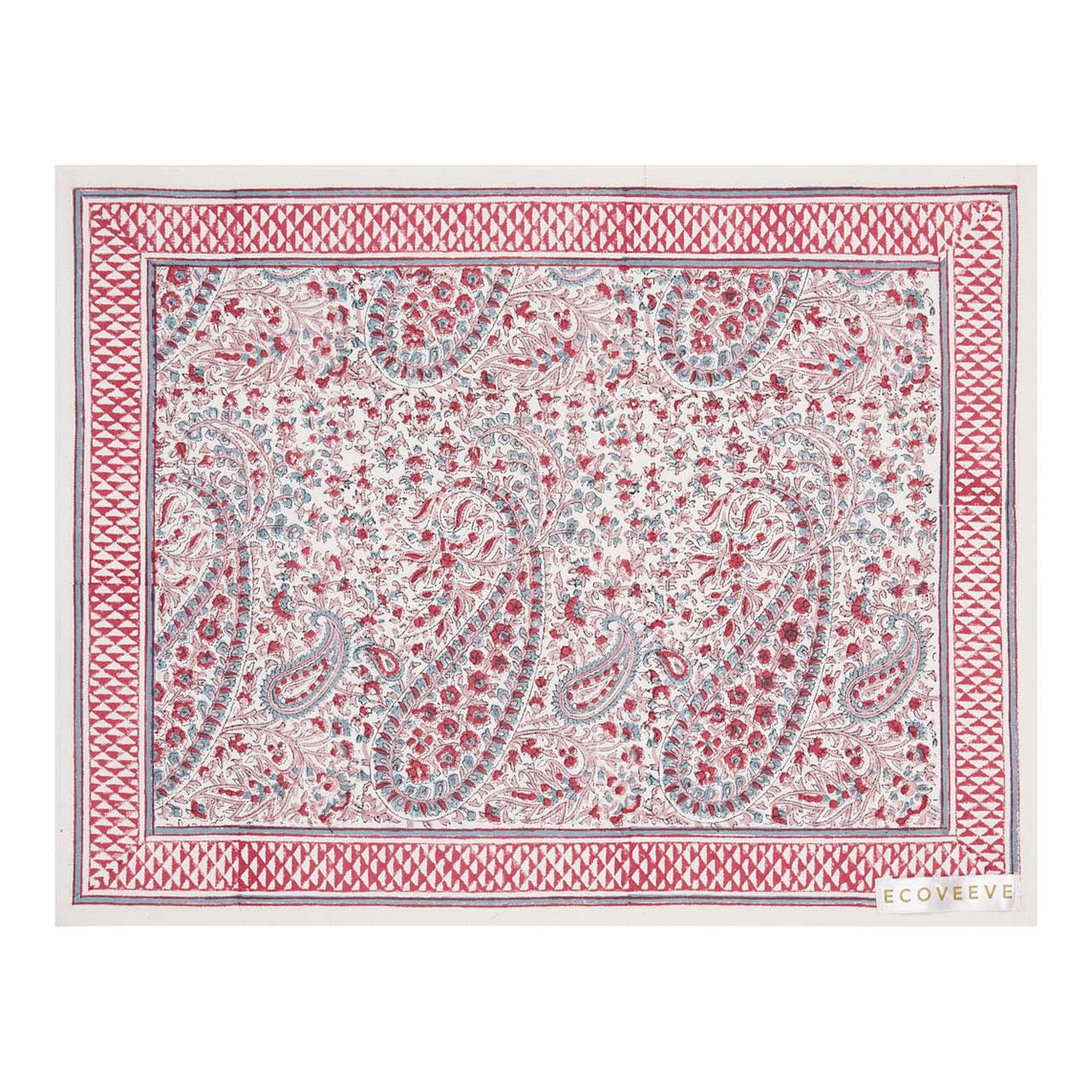 A hand-block printed pink and white floral patterned table mat.