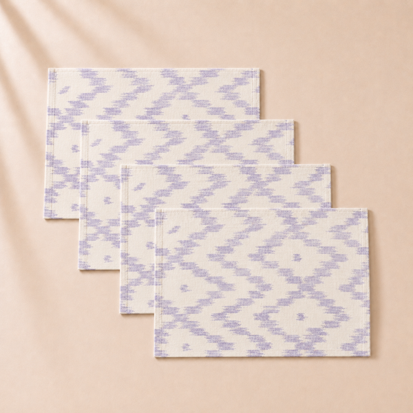 Set of fourpatterned placemats  on a beige background