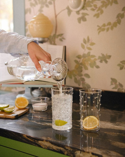 Clear Pom Highball Glass and Clear Pom Water Carafe Issy Granger