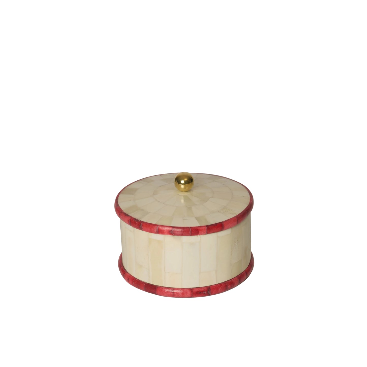 Round decorative box with red inlay and gold knob on a white background