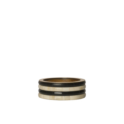 Three ring bands stacked on a white background