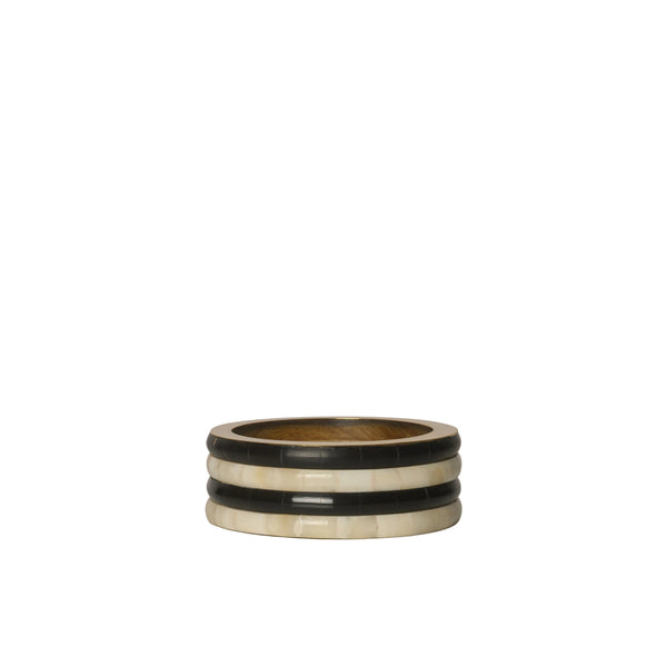 Three ring bands stacked on a white background