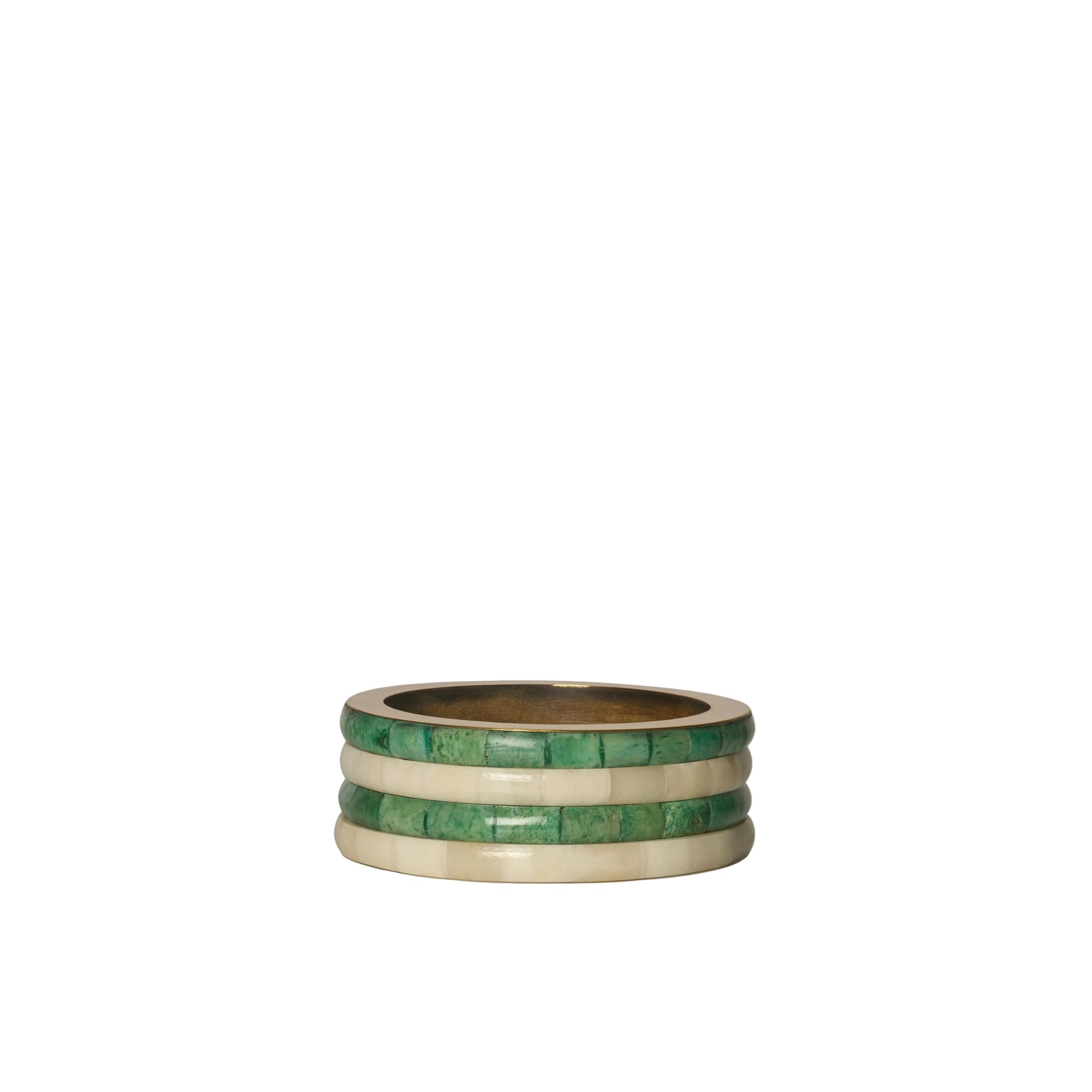 Stack of three green and gold rings on a white background
