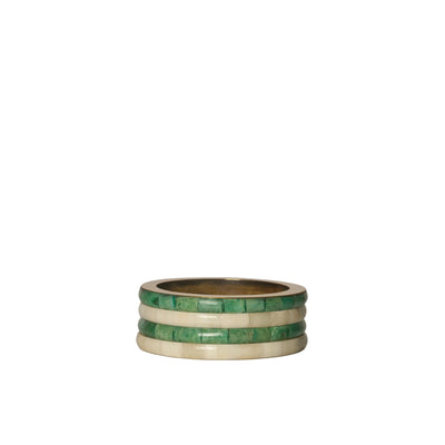 Stack of three green and gold rings on a white background