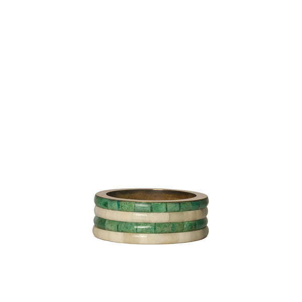 Stack of three green and gold rings on a white background