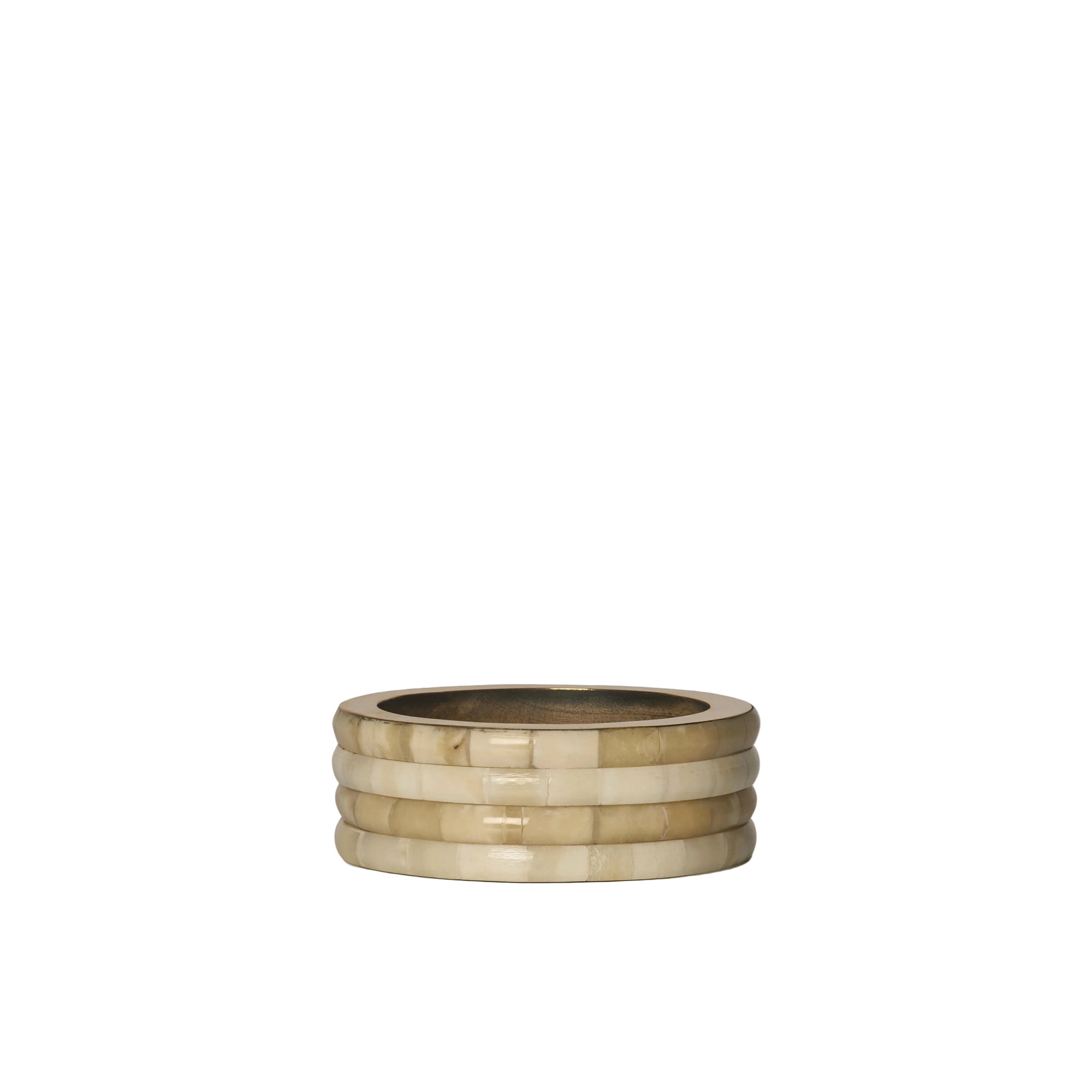 Stack of beige ceramic bowls on a white background
