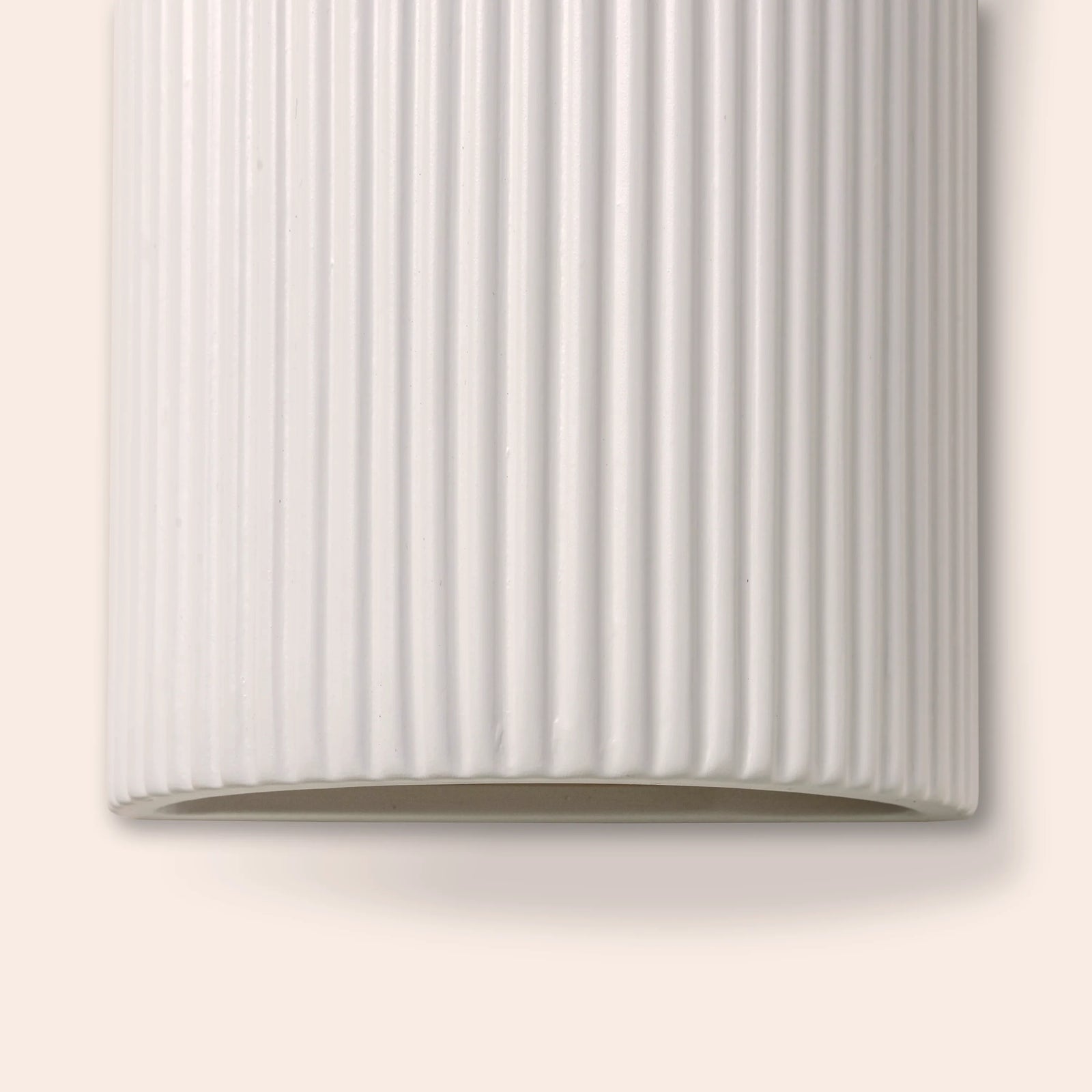 White ribbed ceramic pillar wall light