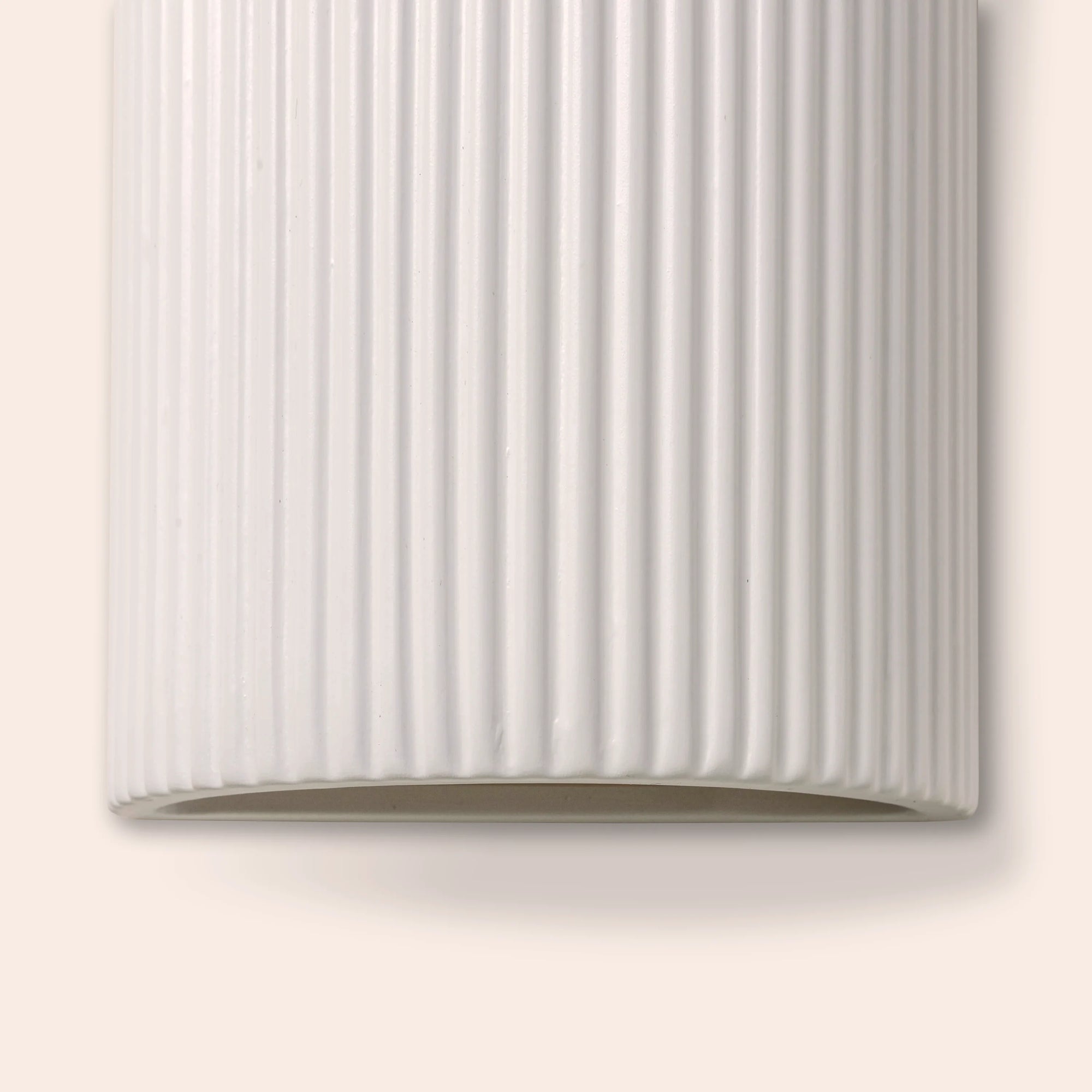 White ribbed ceramic pillar wall light