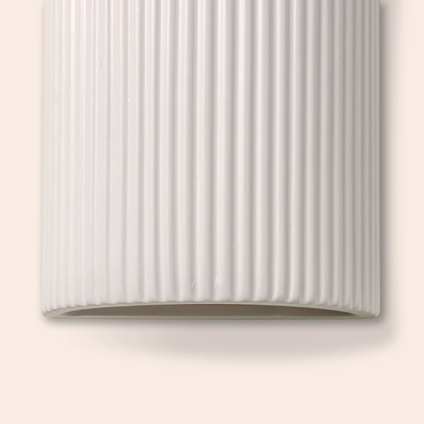White ribbed ceramic pillar wall light
