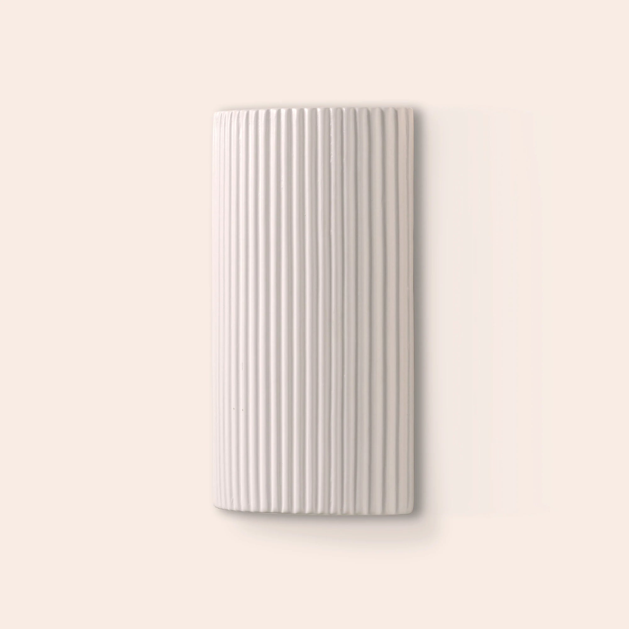 White ribbed ceramic pillar wall light