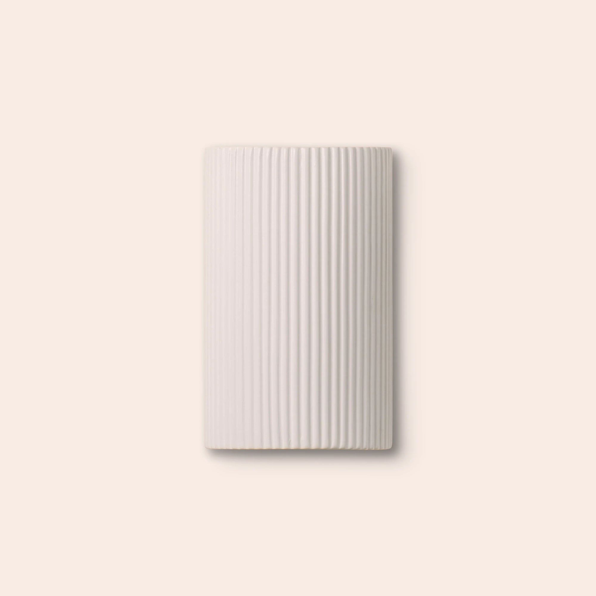 White ribbed ceramic pillar wall light
