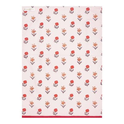 A cotton tea towel with a hand-block printed floral pattern in red and orange on a white background, crafted by artisans.