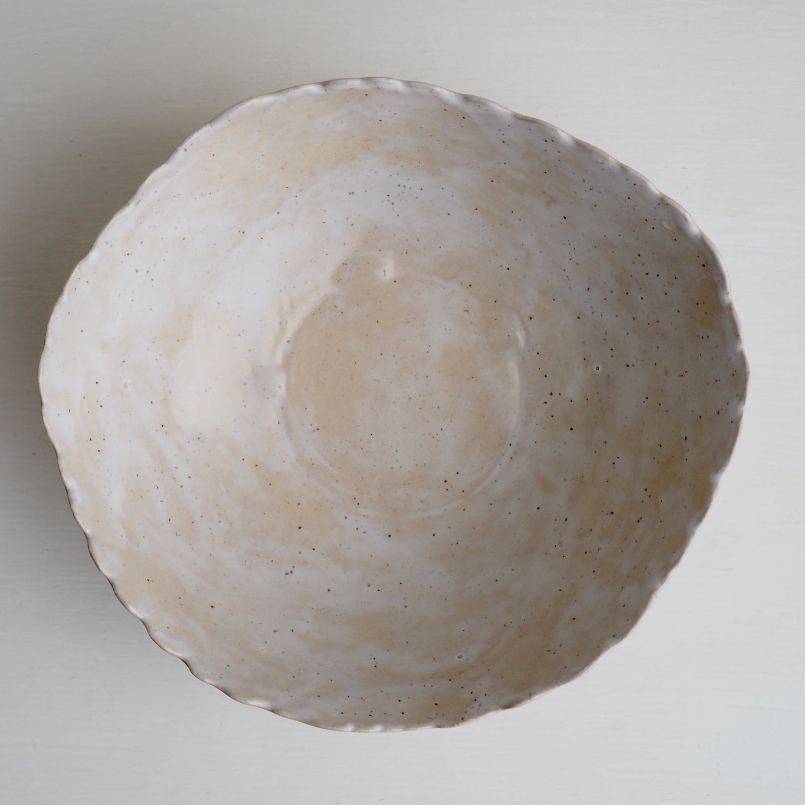 Handmade Cream/White Speckled Scalloped Ceramic Serving Bowl.