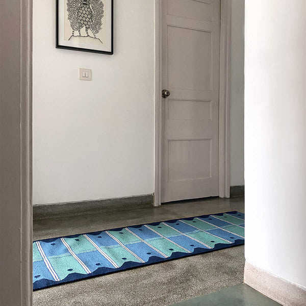 Hallway with blue and green runner rug